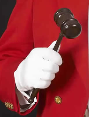 Toastmaster with gavel at the toastmaster training course